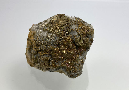 Marcasite, pyrite with tarnish on calcite, Hüttenberg, Carinthia, Austria