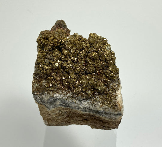 Pyrite with tarnish on calcite, Hüttenberg, Carinthia, Austria