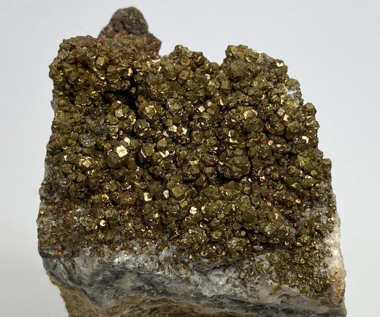 Pyrite with tarnish on calcite, Hüttenberg, Carinthia, Austria