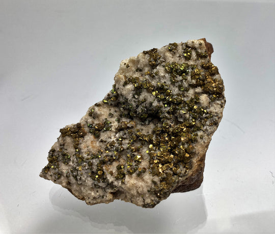 Pyrite with tarnish on calcite, Hüttenberg, Carinthia, Austria