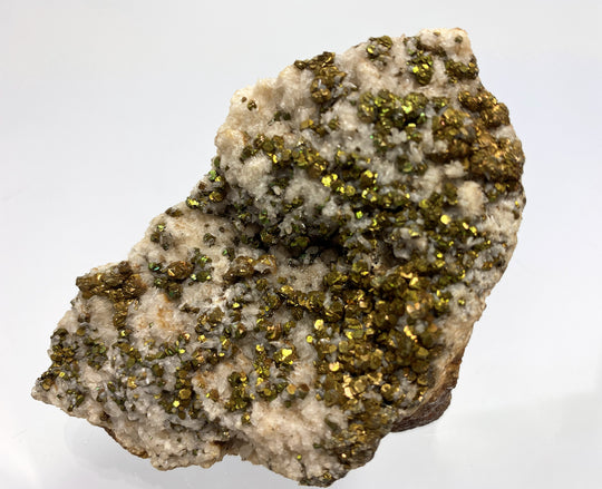 Pyrite with tarnish on calcite, Hüttenberg, Carinthia, Austria