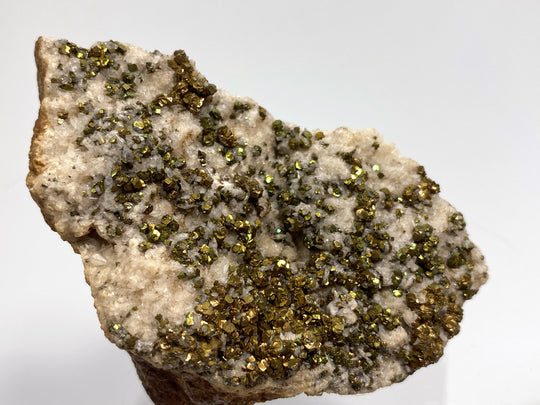Pyrite with tarnish on calcite, Hüttenberg, Carinthia, Austria