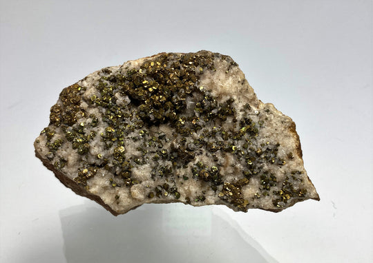 Pyrite with tarnish on calcite, Hüttenberg, Carinthia, Austria