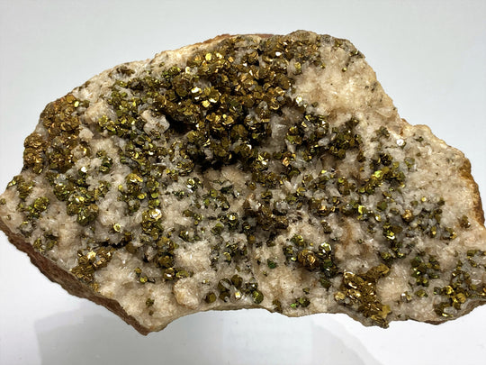 Pyrite with tarnish on calcite, Hüttenberg, Carinthia, Austria