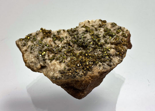 Pyrite with tarnish on calcite, Hüttenberg, Carinthia, Austria