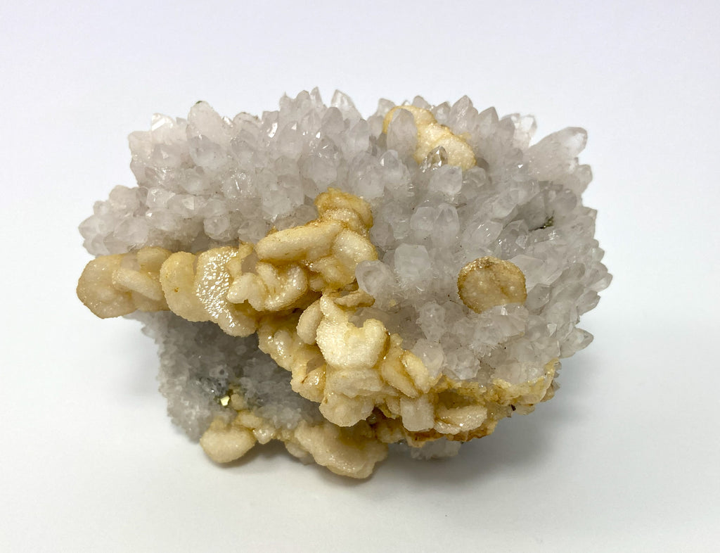 Calcite on light amethyst, Cavnic, Maramures, Romania