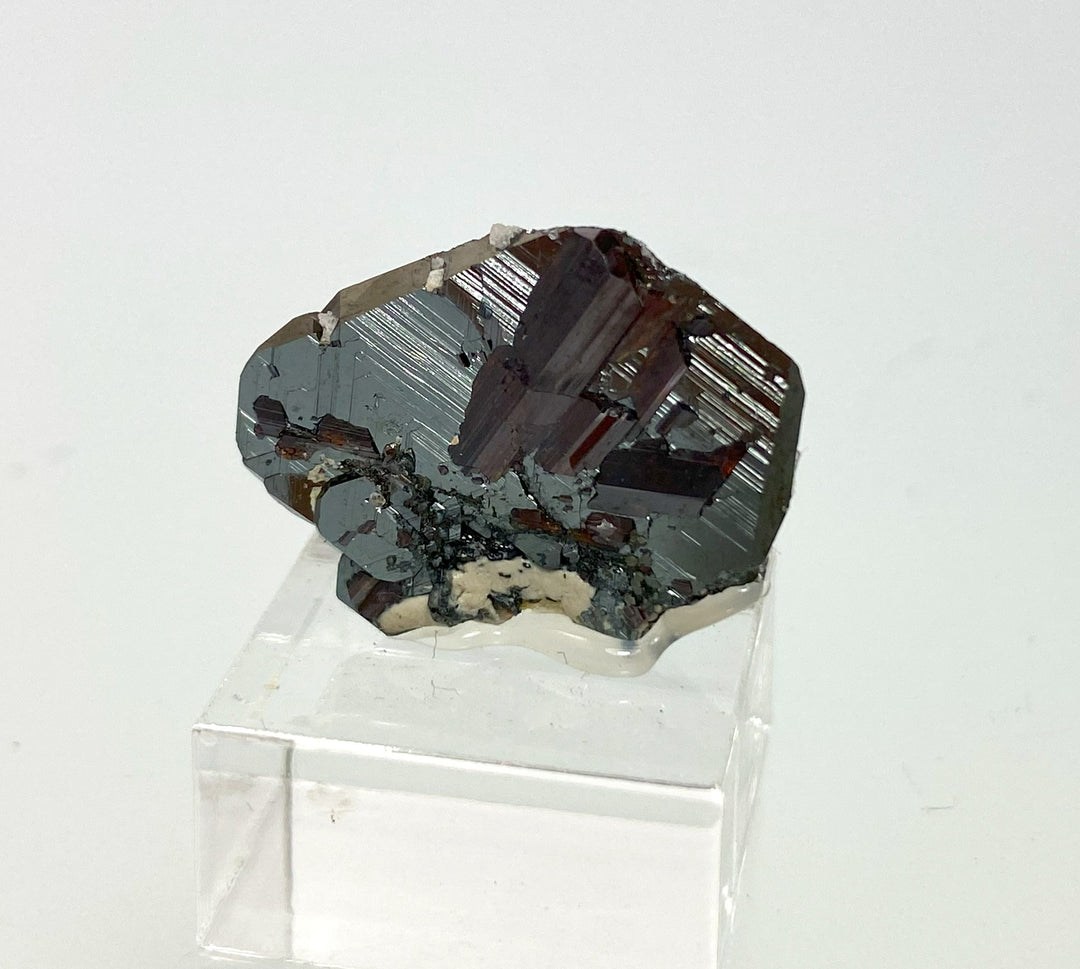 Rutile on hematite, Cavradi Gorge, Disentis, Graubünden, Switzerland