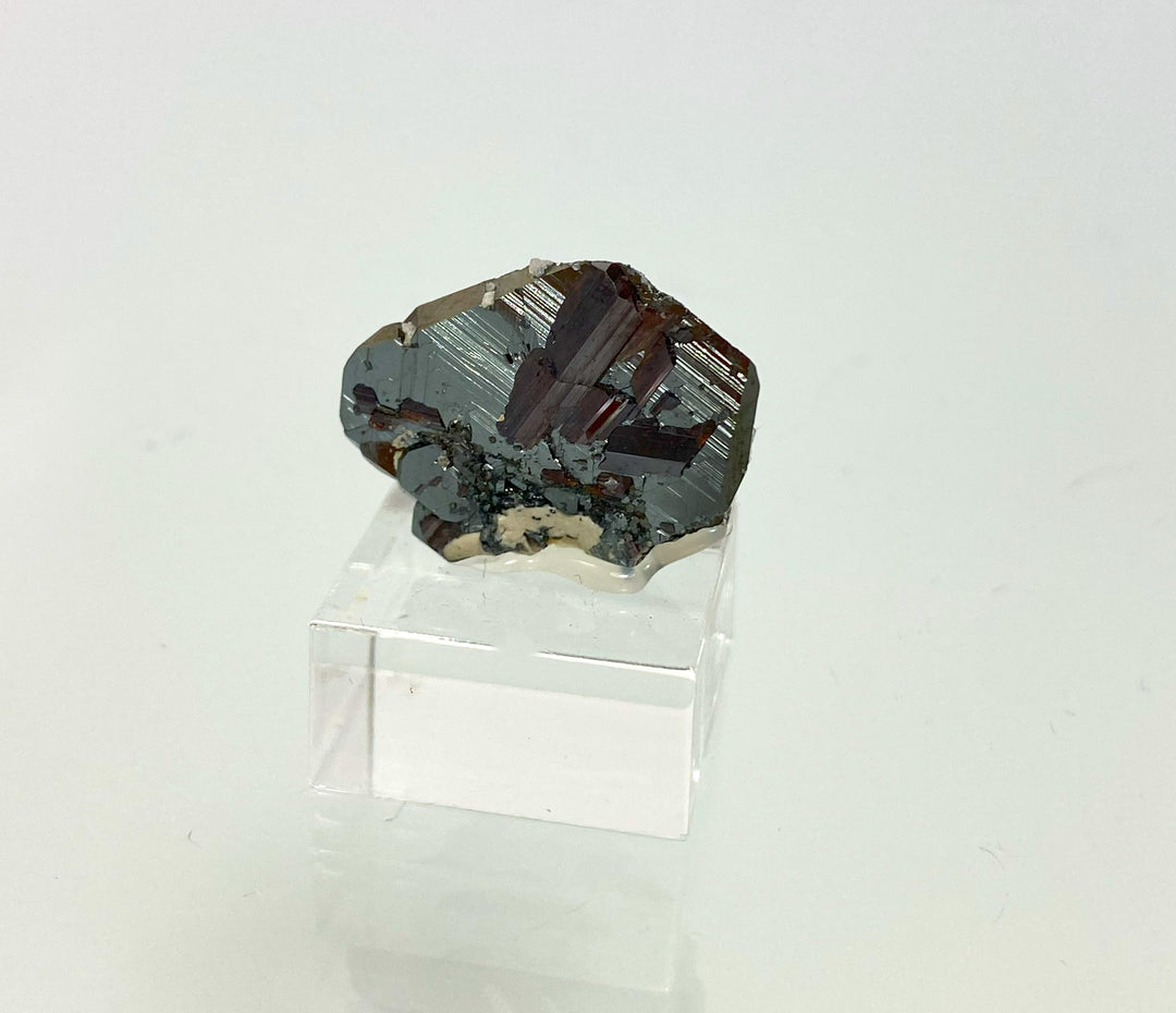 Rutile on hematite, Cavradi Gorge, Disentis, Graubünden, Switzerland